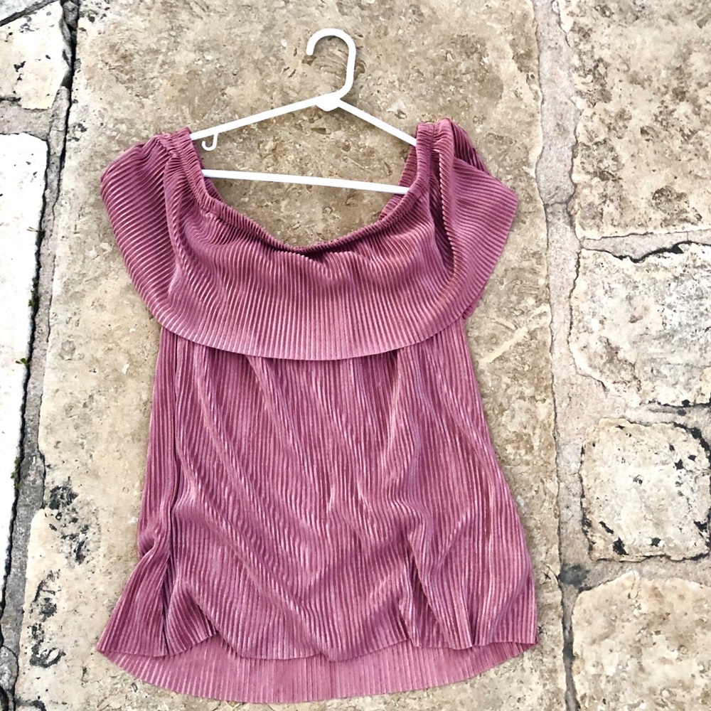 Pink off the shoulder shirt.